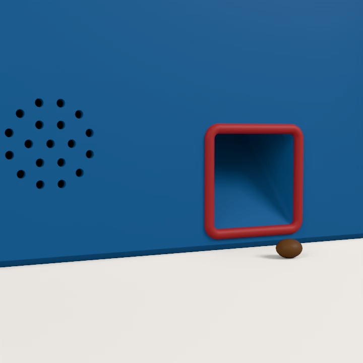 The Cat Slot's chute, with a treat that's just dropped out